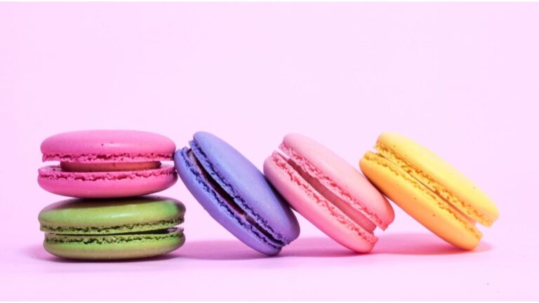 A selection of colorful macarons in various shades, showcasing vibrant food colors.